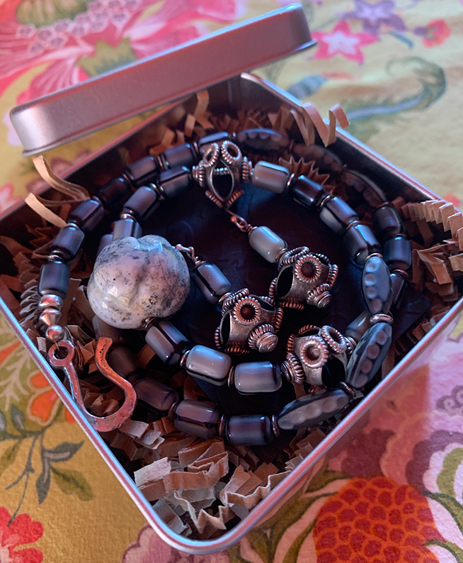 Necklace Set | Carved gray focal stone, gray vintage glass beads,"flying saucer" Bali beads