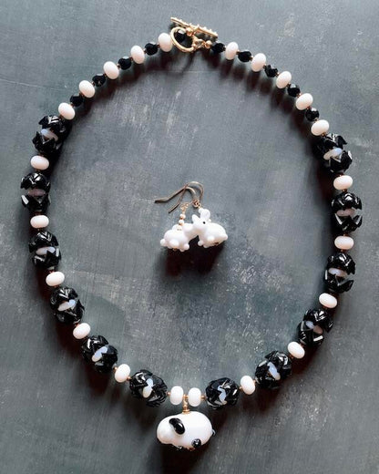 Necklace set | Artisan glass lampwork bunny beads, 1940s jet black puzzle beads, mid-century white glass beads