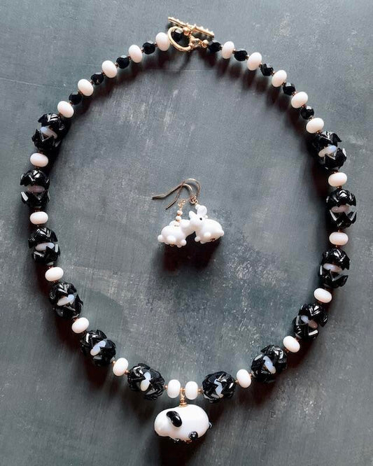 Necklace set | Artisan glass lampwork bunny beads, 1940s jet black puzzle beads, mid-century white glass beads