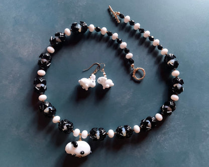 Necklace set | Artisan glass lampwork bunny beads, 1940s jet black puzzle beads, mid-century white glass beads