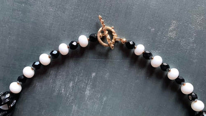 Necklace set | Artisan glass lampwork bunny beads, 1940s jet black puzzle beads, mid-century white glass beads