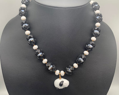 Necklace set | Artisan glass lampwork bunny beads, 1940s jet black puzzle beads, mid-century white glass beads