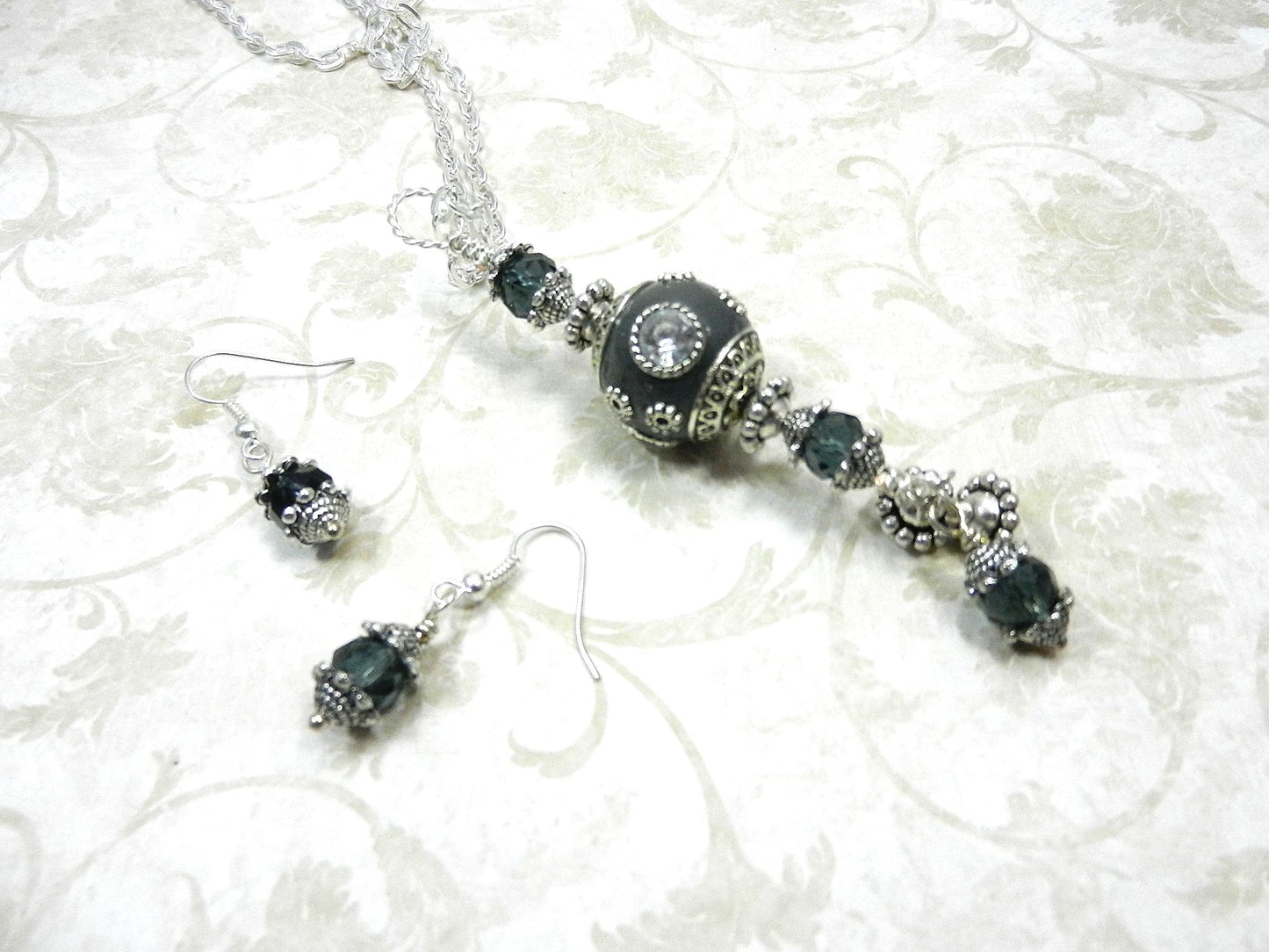 Silver Necklace with a Large Grey and Silver Artesian Bead and Matching Gray Crystal Earrings