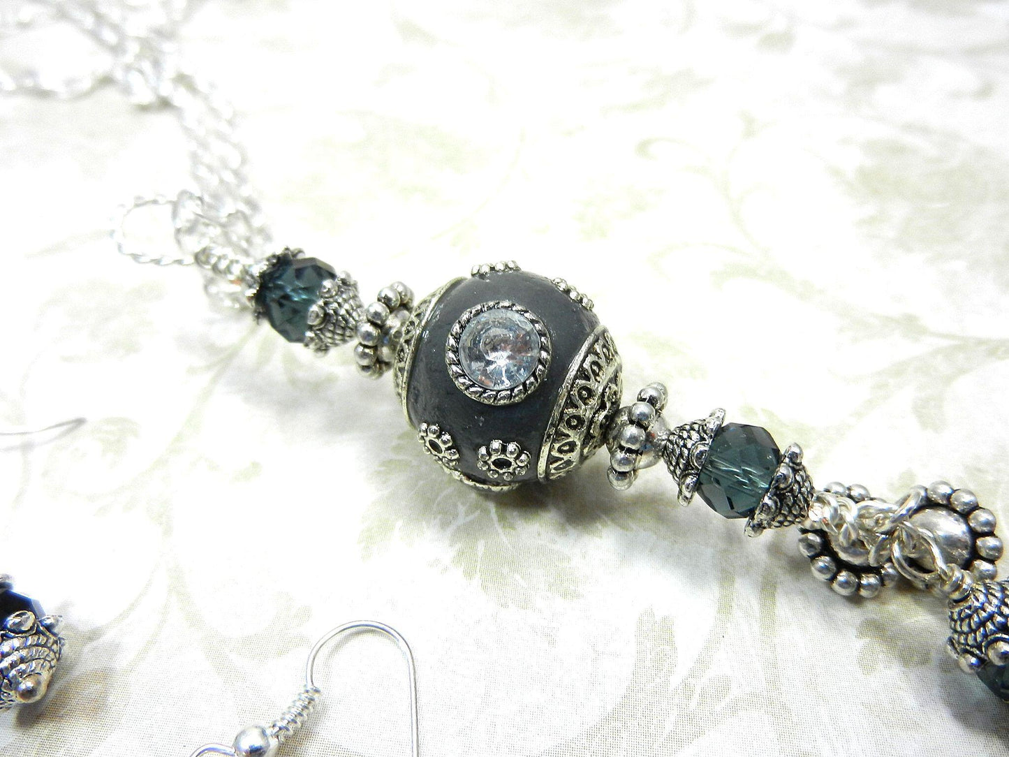 Silver Necklace with a Large Grey and Silver Artesian Bead and Matching Gray Crystal Earrings