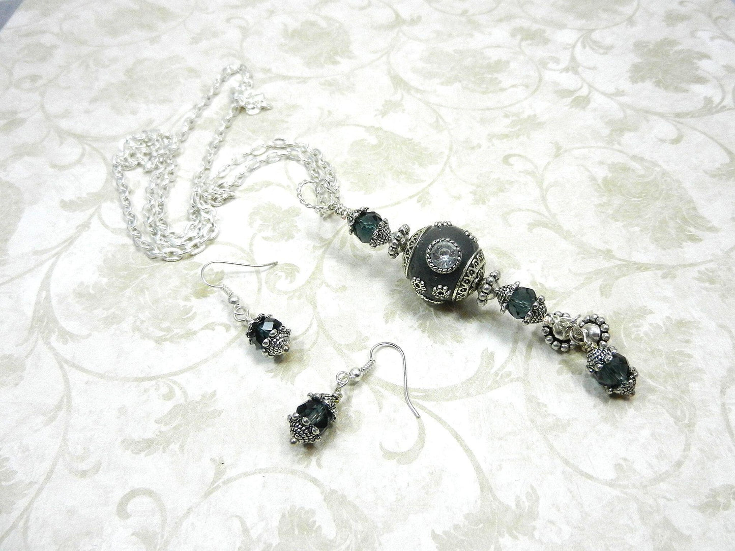 Silver Necklace with a Large Grey and Silver Artesian Bead and Matching Gray Crystal Earrings