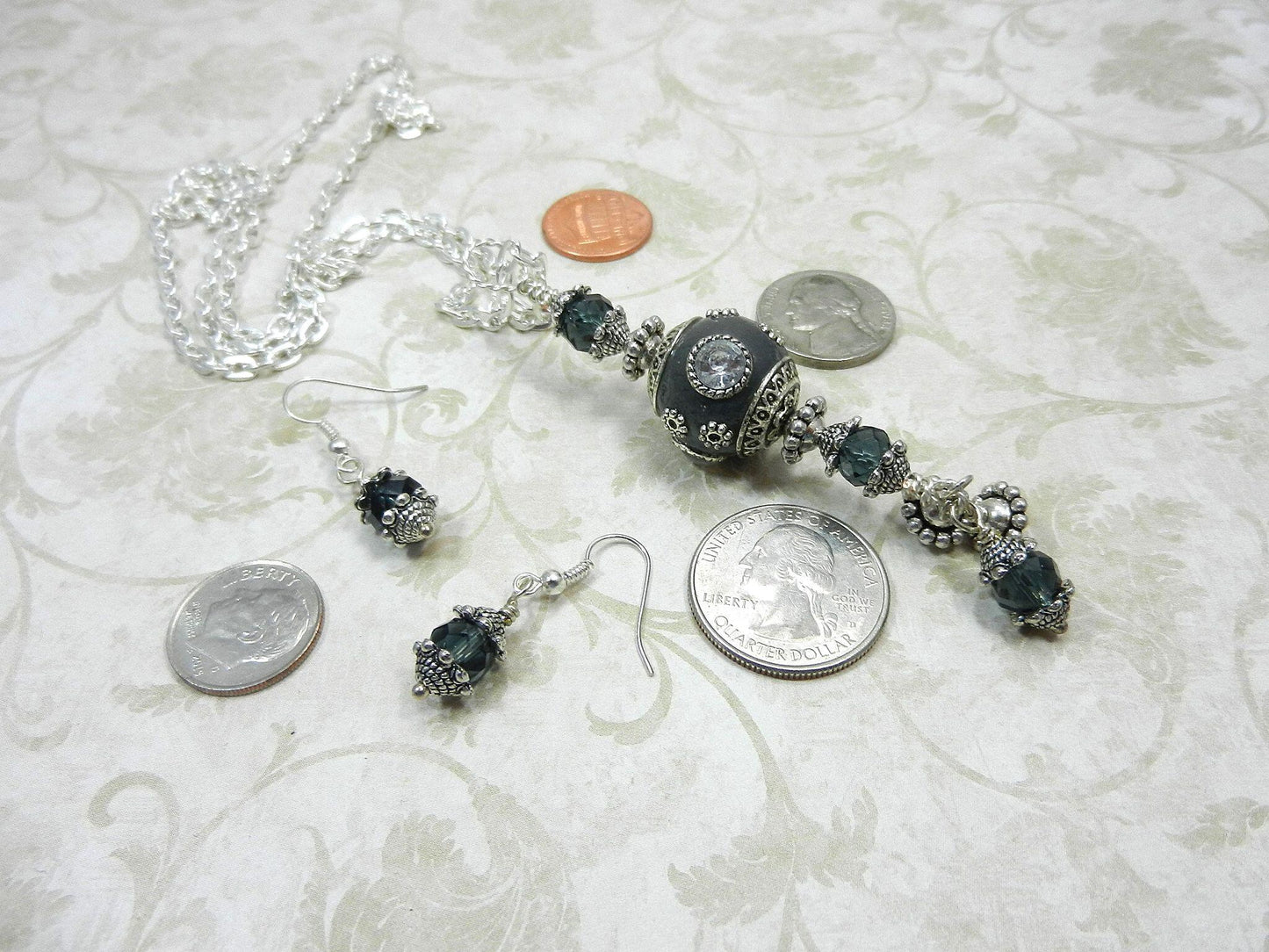 Silver Necklace with a Large Grey and Silver Artesian Bead and Matching Gray Crystal Earrings