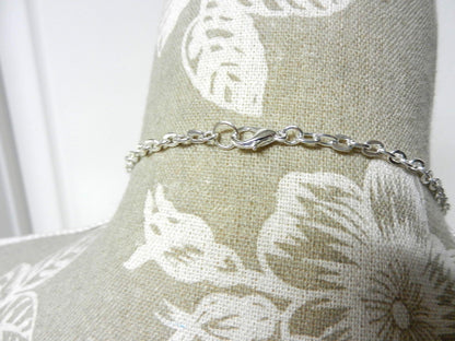 Silver Necklace with a Large Grey and Silver Artesian Bead and Matching Gray Crystal Earrings