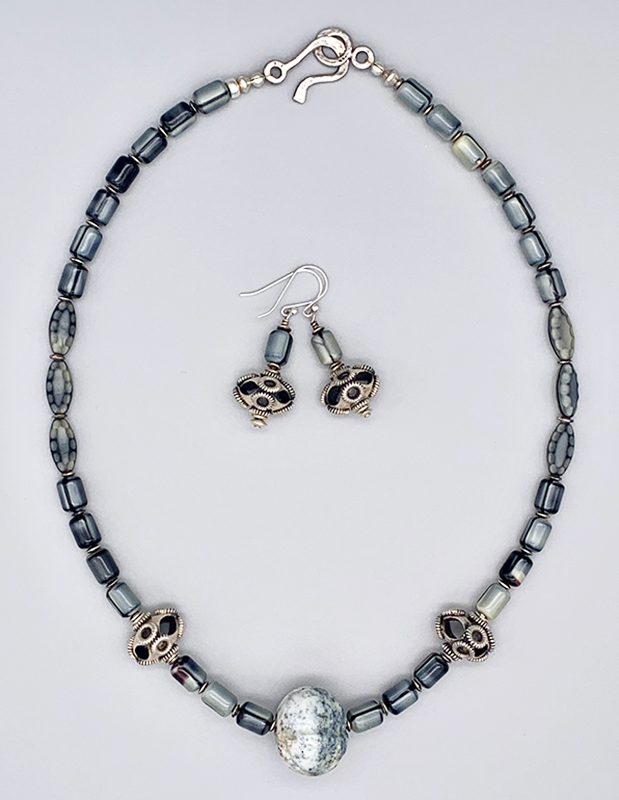 Necklace Set | Carved gray focal stone, gray vintage glass beads,"flying saucer" Bali beads
