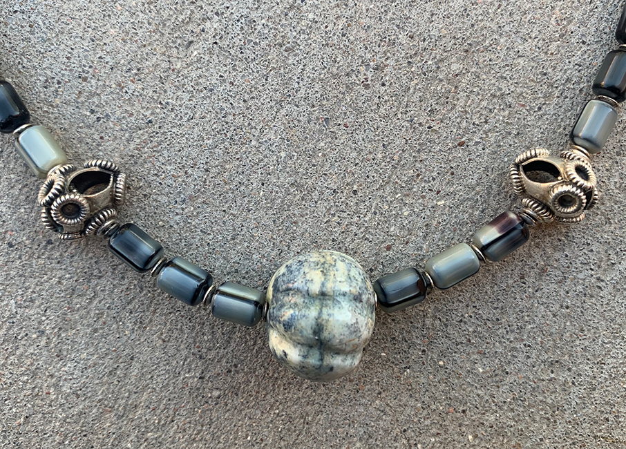 Necklace Set | Carved gray focal stone, gray vintage glass beads,"flying saucer" Bali beads