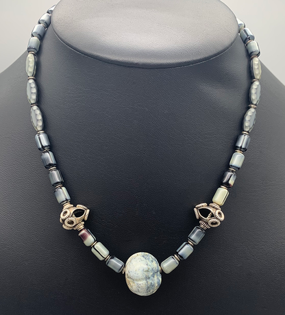 Necklace Set | Carved gray focal stone, gray vintage glass beads,"flying saucer" Bali beads