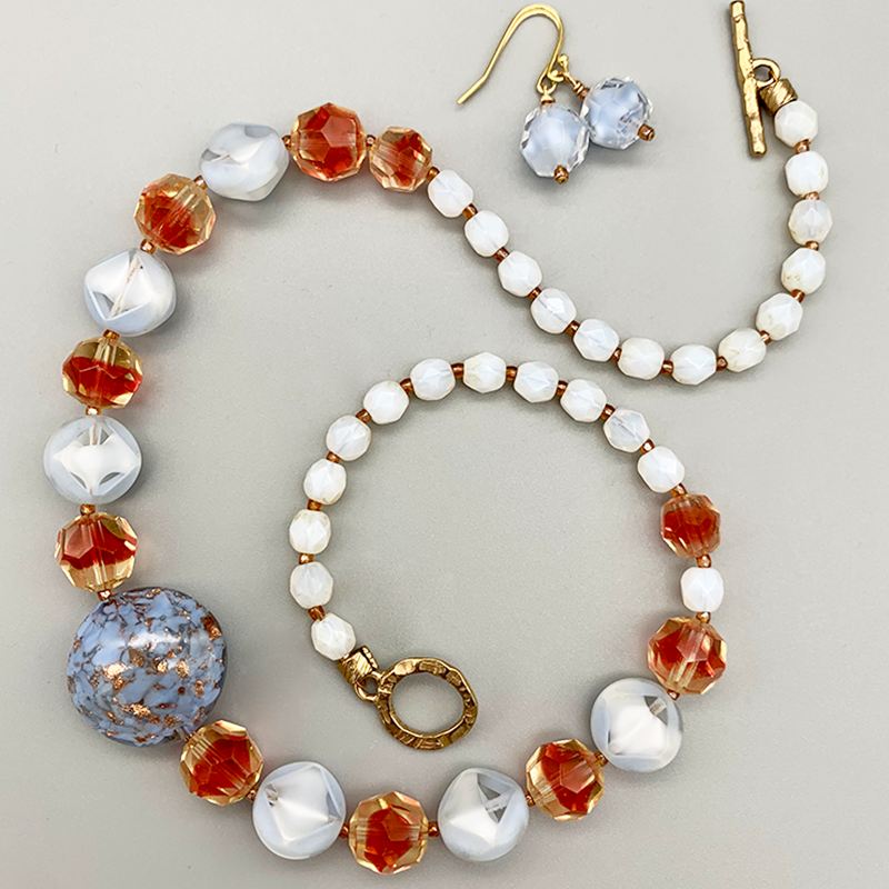 Necklace Set | Venetian perwinkle focal disk, ruby/topaz givre faceted rounds, pale blue givre, and opalescent vintage glass beads
