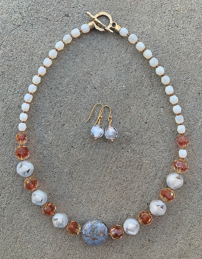Necklace Set | Venetian perwinkle focal disk, ruby/topaz givre faceted rounds, pale blue givre, and opalescent vintage glass beads