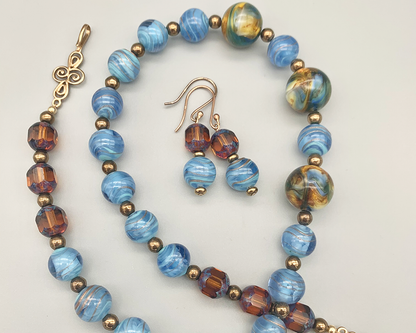 Necklace Set | Cherry Brand blue/gold givre rounds, German marbled lampwork