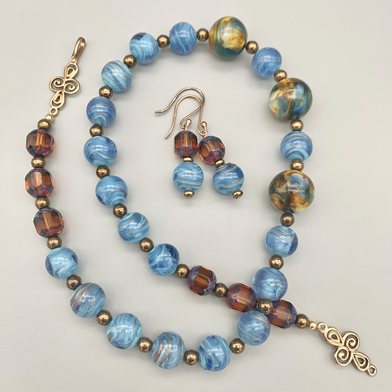 Necklace Set | Cherry Brand blue/gold givre rounds, German marbled lampwork