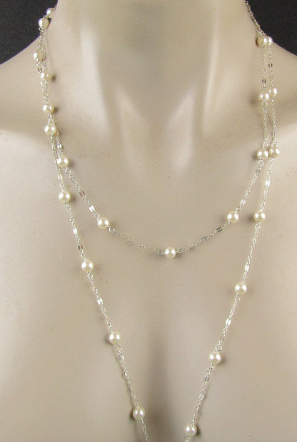 Long sterling silver and pearl necklace, 45 inches long with a sterling silver magnetic clasp, it's the perfect gift for her