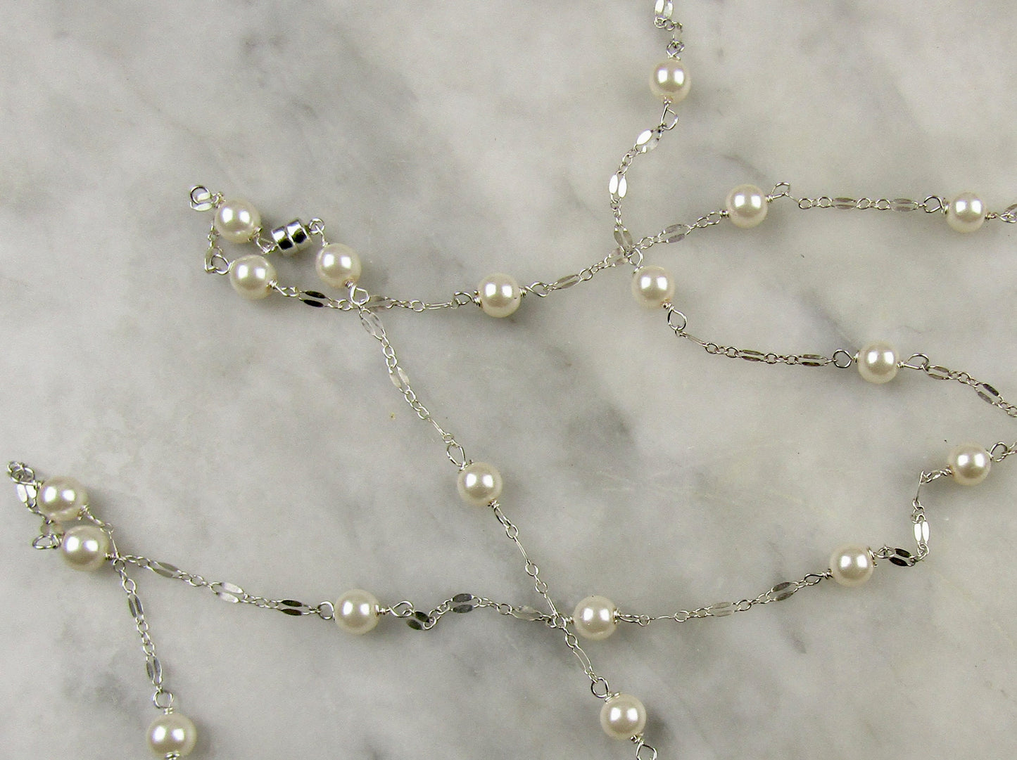 Long sterling silver and pearl necklace, 45 inches long with a sterling silver magnetic clasp, it's the perfect gift for her