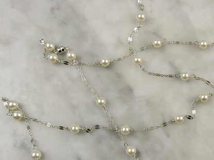 Long sterling silver and pearl necklace, 45 inches long with a sterling silver magnetic clasp, it's the perfect gift for her