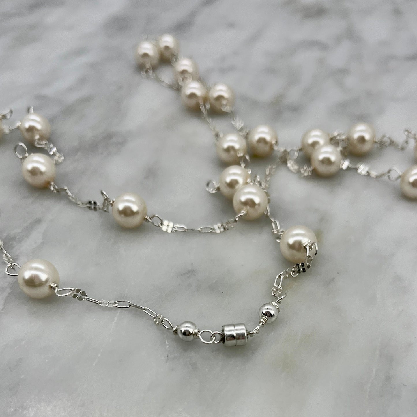 Long sterling silver and pearl necklace, 45 inches long with a silver magnetic clasp, the perfect gift for her