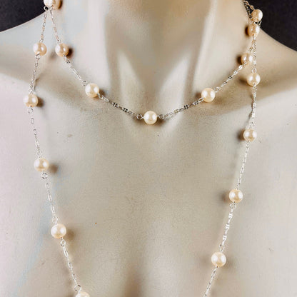 Long sterling silver and pearl necklace, 45 inches long with a silver magnetic clasp, the perfect gift for her