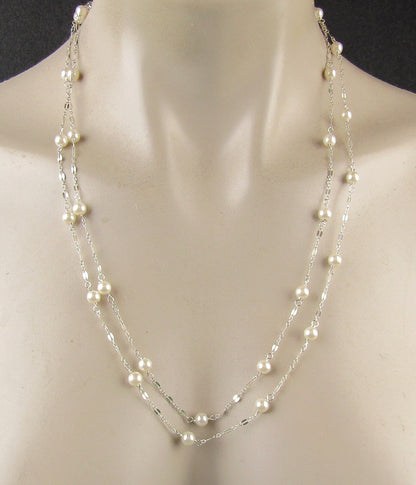 Long sterling silver and pearl necklace, 45 inches long with a sterling silver magnetic clasp, it's the perfect gift for her
