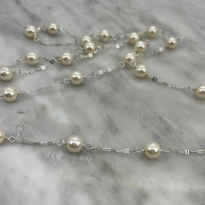 Long sterling silver and pearl necklace, 45 inches long with a silver magnetic clasp, the perfect gift for her