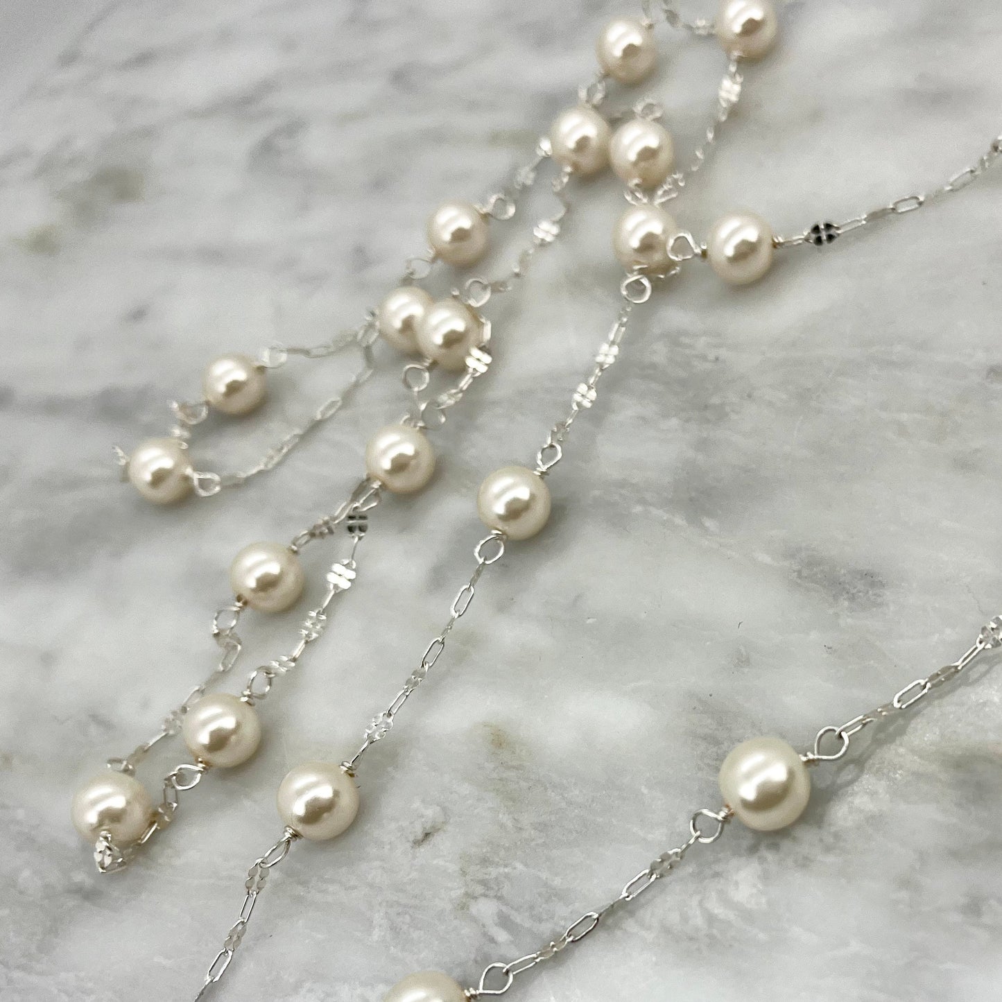 Long sterling silver and pearl necklace, 45 inches long with a silver magnetic clasp, the perfect gift for her